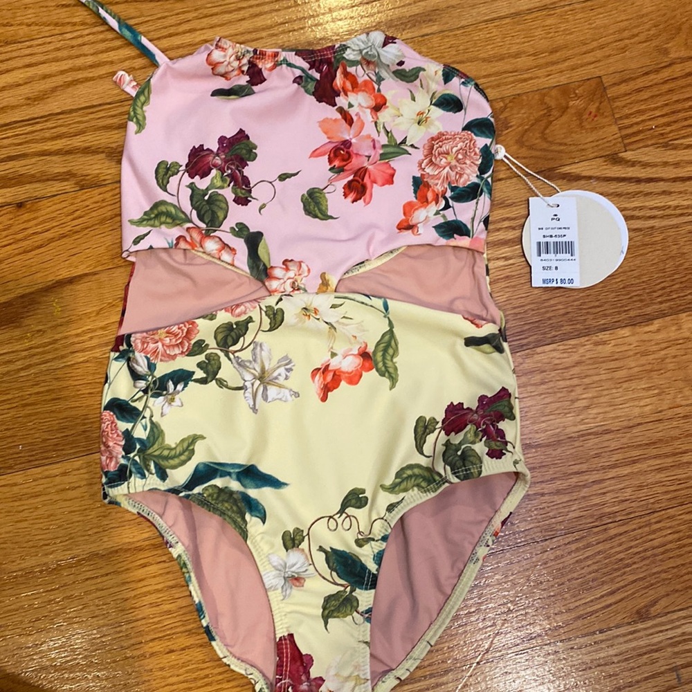 Pilyq one piece with cut outs. Never worn